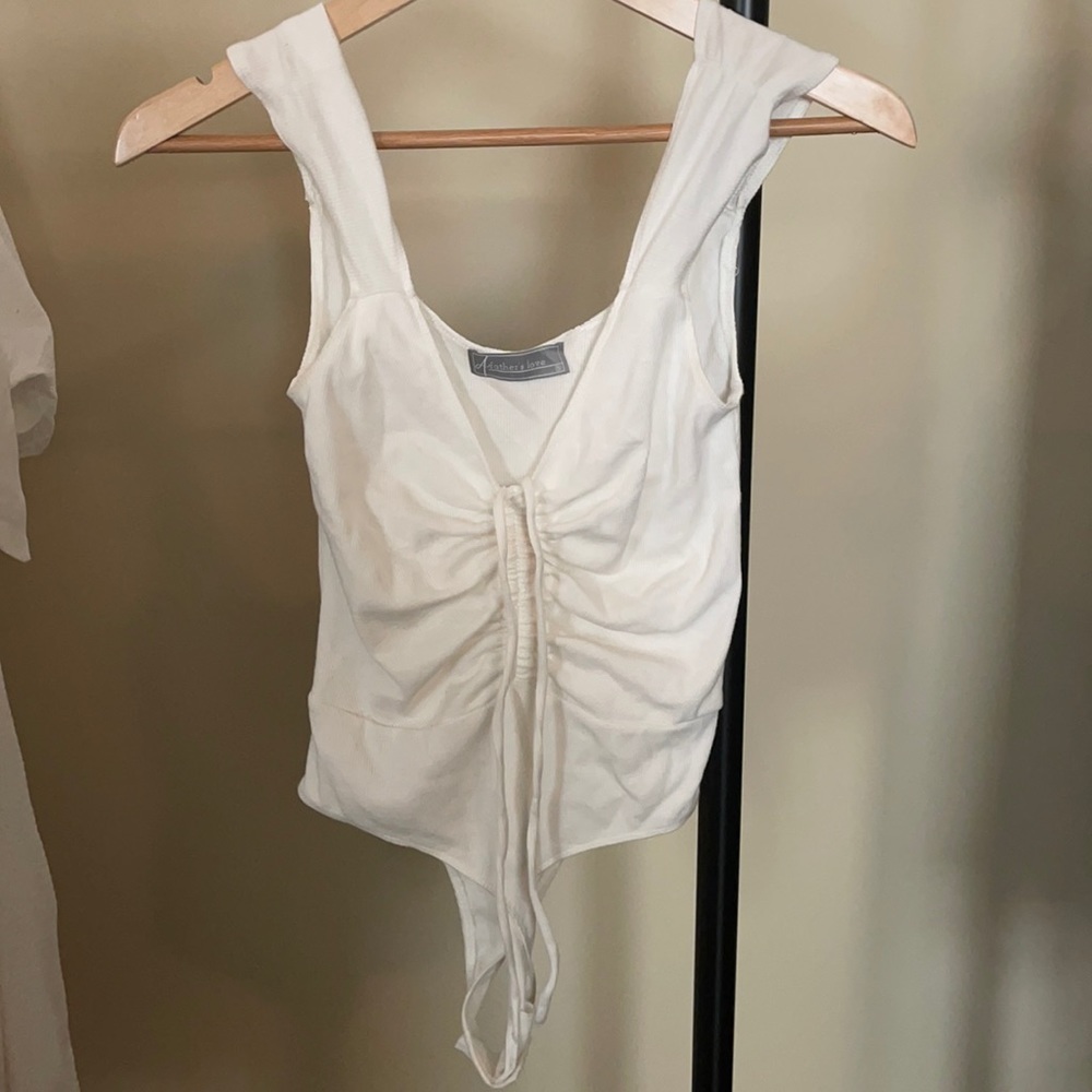 White “A Fathers Love” bodysuit